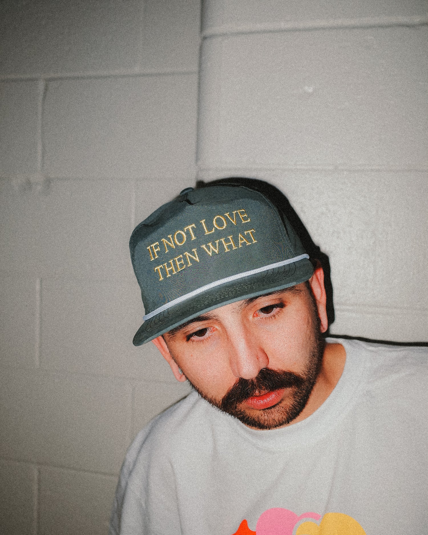 Sage snapback hat featuring yellow embroidered text that reads "IF NOT LOVE THEN WHAT"